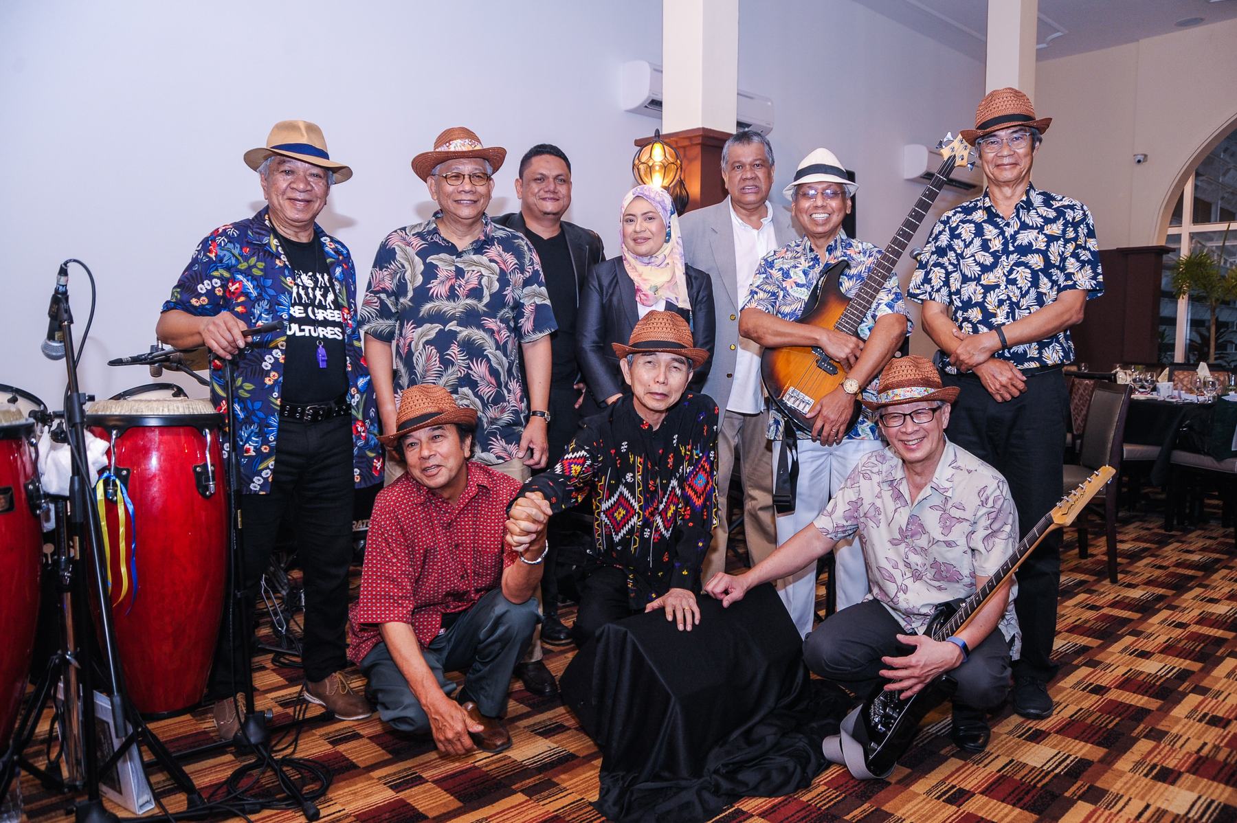 Band and guests posing together