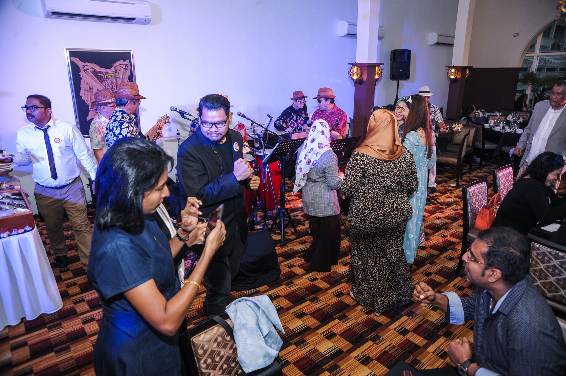 A crowded hall during a celebration