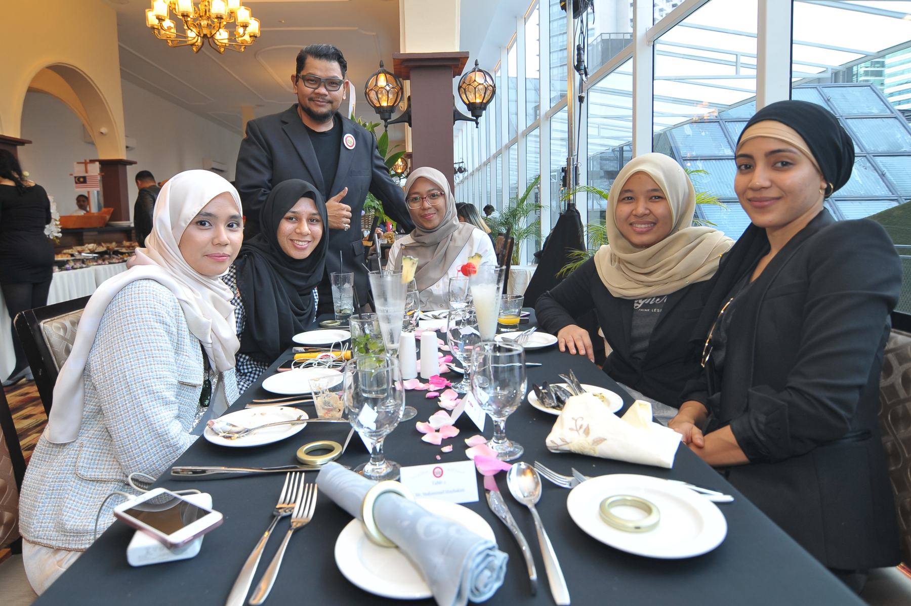Guests at a dinner table